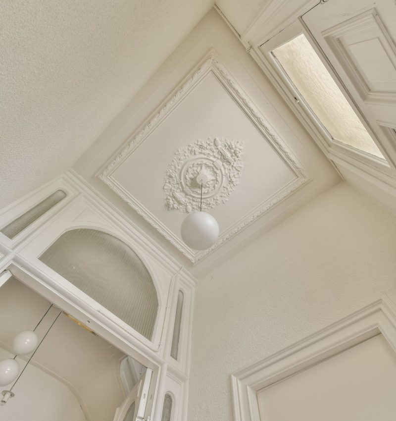 stucco-ornament-above-elegant-chandelier-2026-01-07-23-27-53-utc