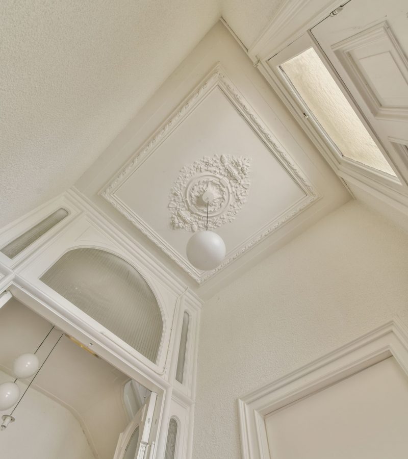 stucco-ornament-above-elegant-chandelier-2026-01-07-23-27-53-utc